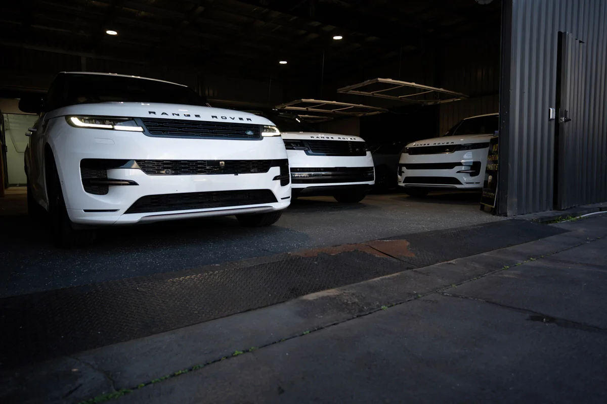 Range Rovers at the entrance to Spectrum’s workshop